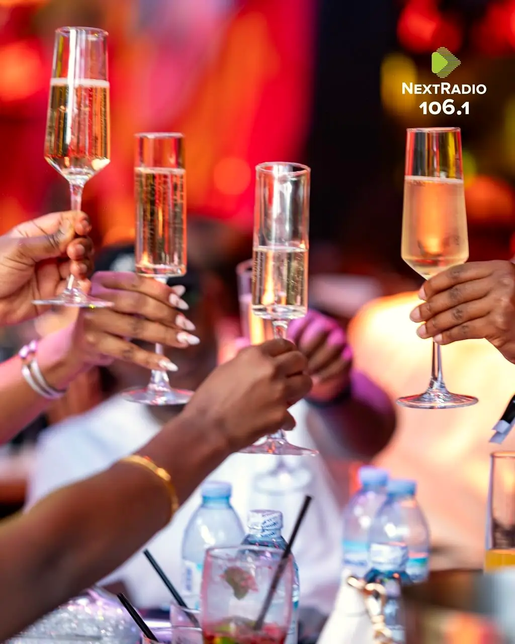 Guests raising champagne flutes