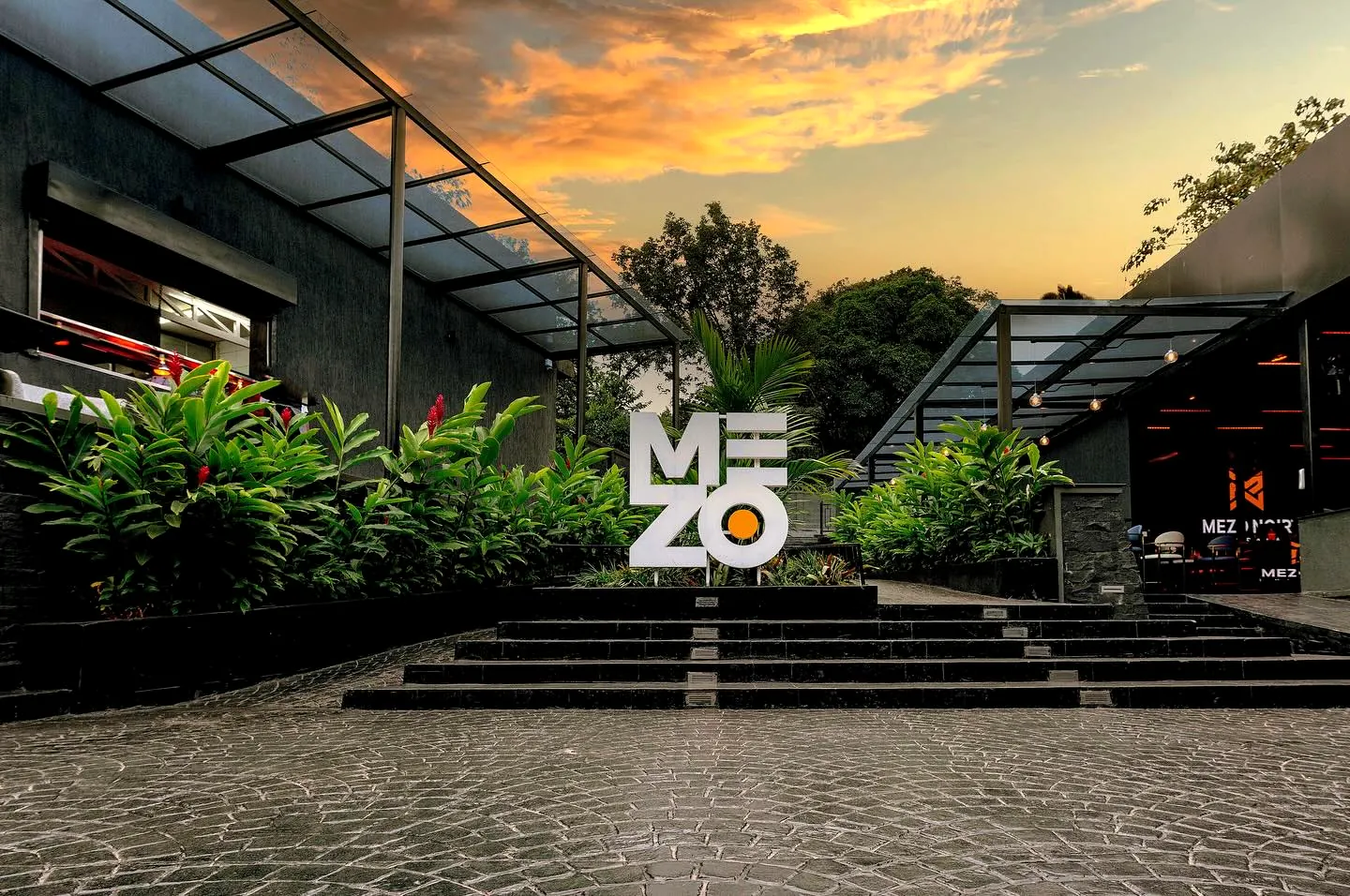 The Mezo Noir entrance and courtyard at sunset